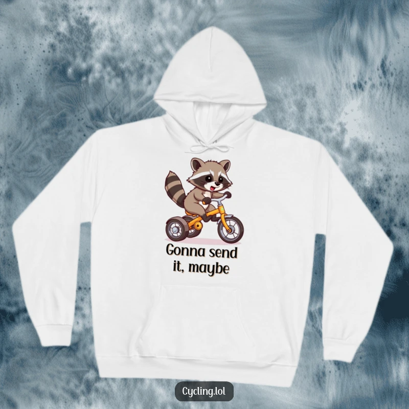 Funny Raccoon Hoodie: A bold raccoon rides a tricycle with a wheelie, bringing a humorous and cozy vibe to your apparel.