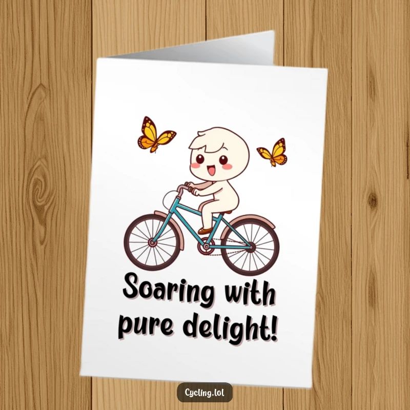Funny Free Printable Congratulations Card: a playful Kawaii character delightedly chasing a butterfly on a bicycle, radiating happiness.