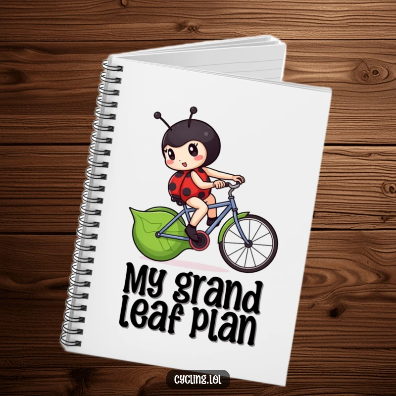 Funny ladybug notebook showing a determined ladybug furiously pedaling a leaf-shaped bicycle, ideal for journaling.